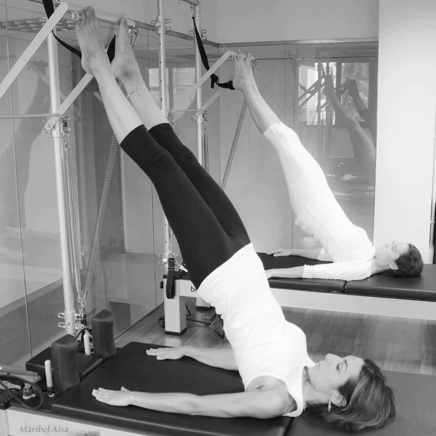 Sesión de pilates en reformer